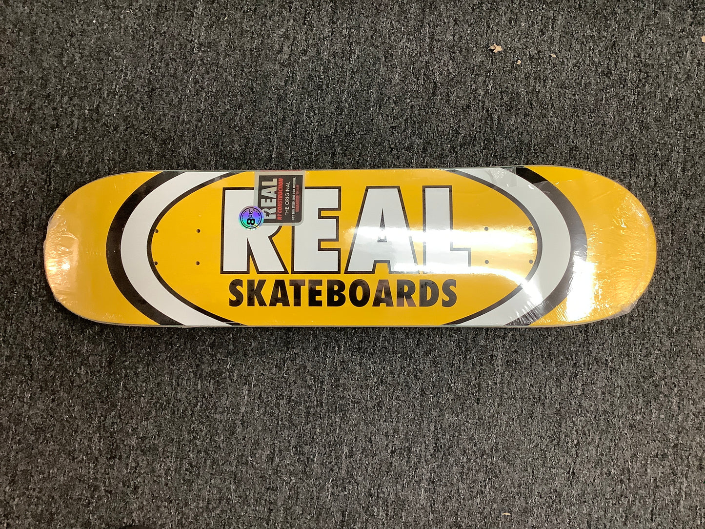 Real Deck 8.06 Logo Yellow