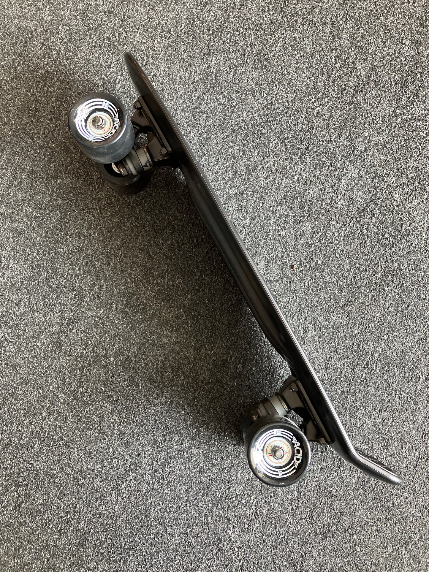 Swell Complete Black skateboard cruiser with Acid Wheels