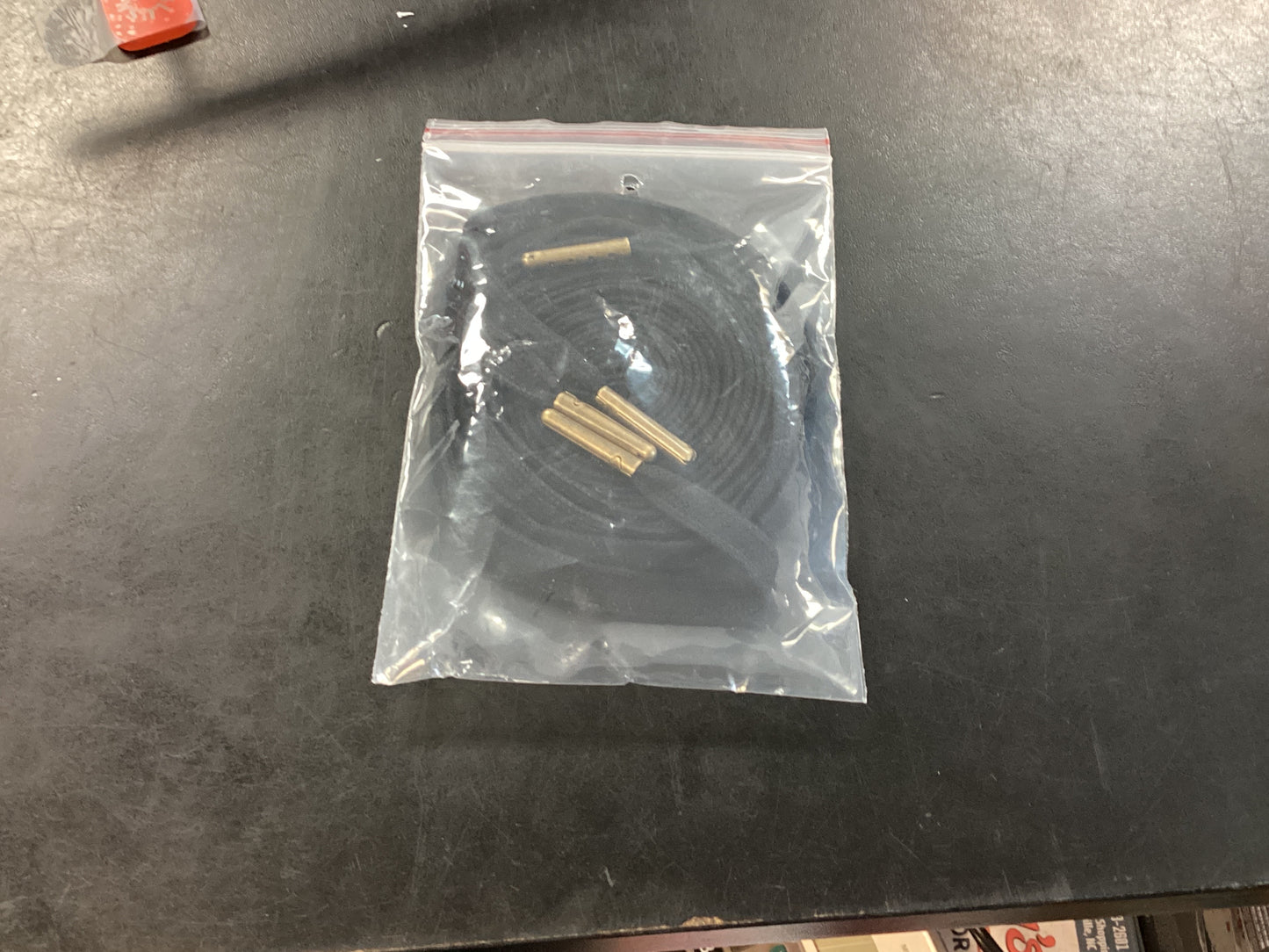 Black shoe laces w/ black aglets