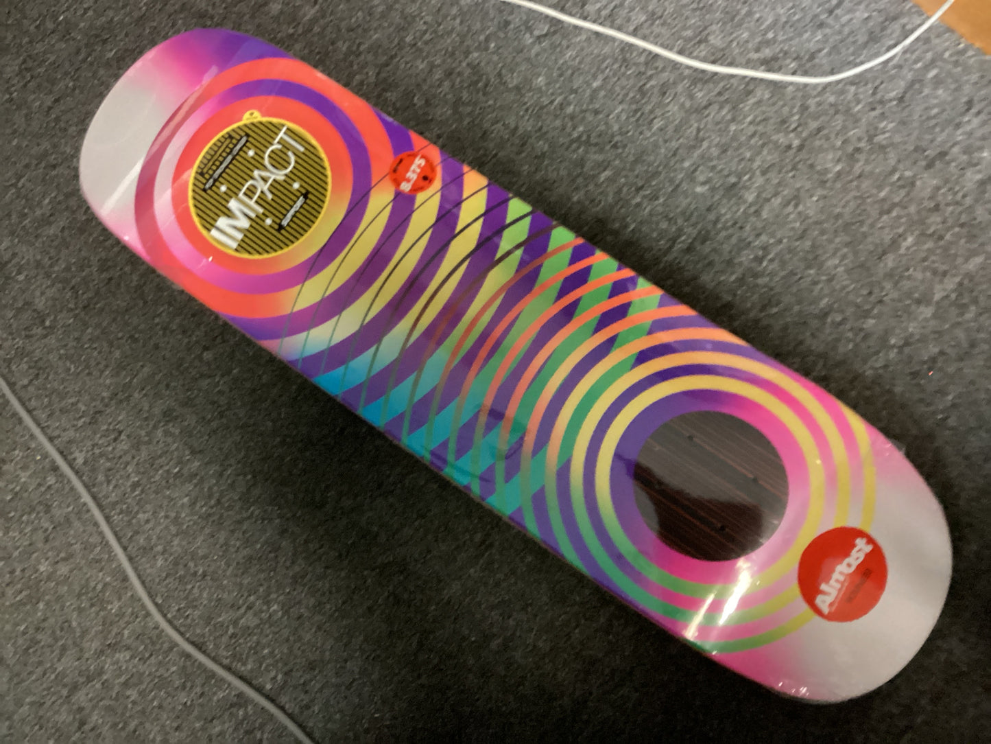 Almost 8.375” skateboard deck Youness Gradient Rings IMPACT CONSTRUCTION