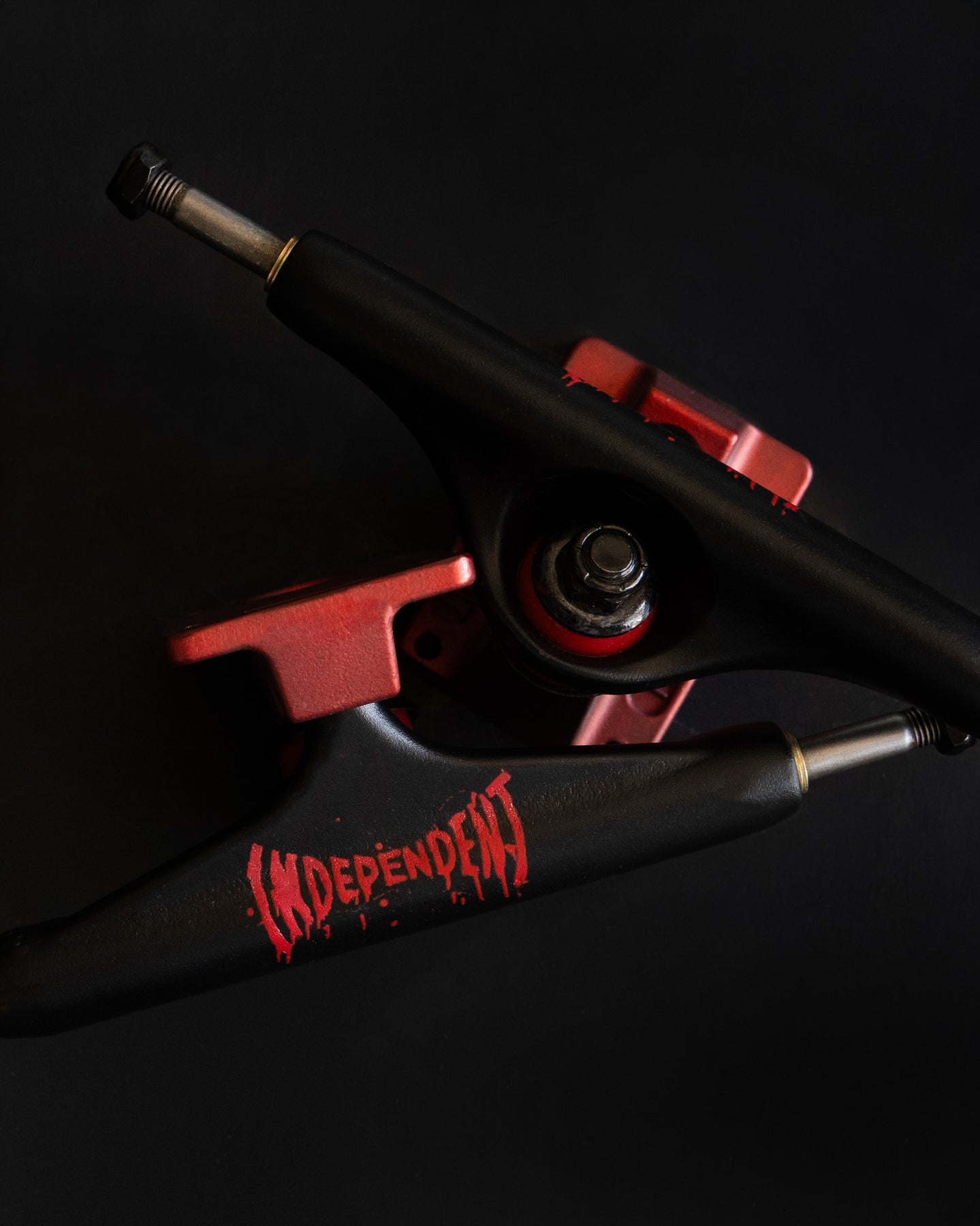 Independent 149 stage 11 skateboard truck set Splatter Span Black and Ano Red standard