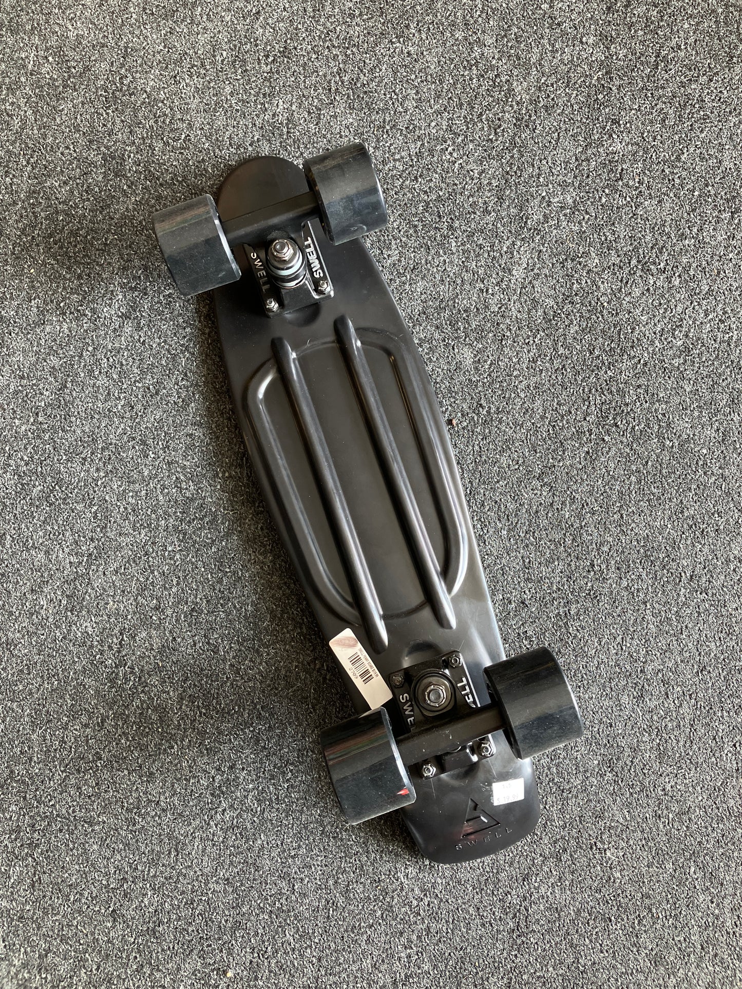 Swell Complete Black skateboard cruiser with Acid Wheels