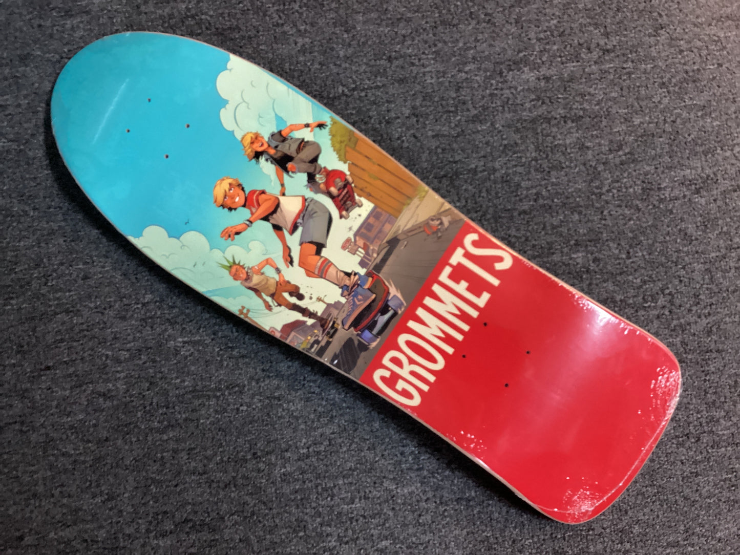 Grommets 10”x31.75” skateboard deck Street Scene