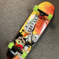 Madrid Complete Skateboard Texas Chainsaw Massacre 9”x33.5” pool shape with Tensor Trucks & green Slimeball light up wheels.
