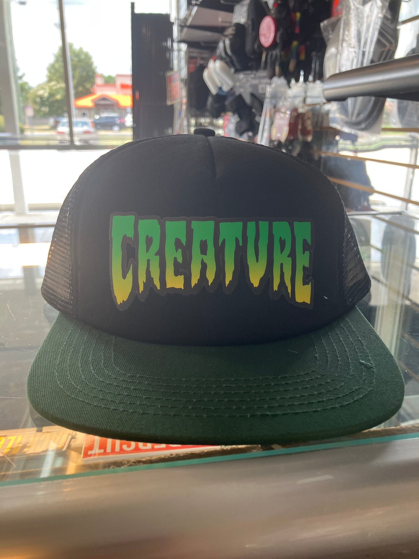 Creature Logo Black/Green Trucker Hat Mesh