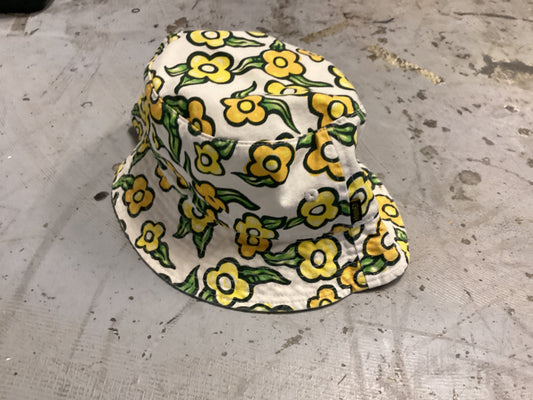 Krooked hat bucket flowers yellow