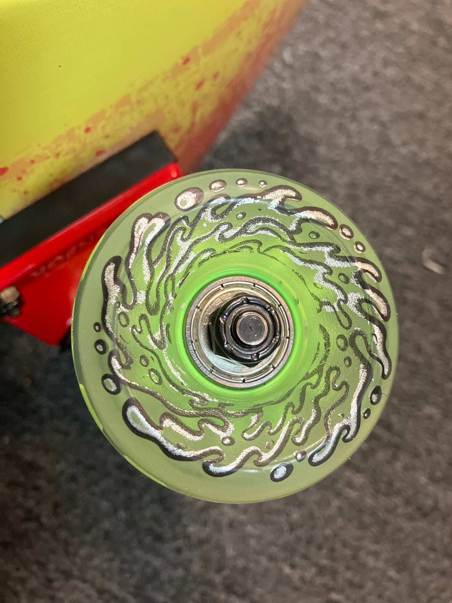 Madrid Complete Skateboard Texas Chainsaw Massacre 9”x33.5” pool shape with Tensor Trucks & green Slimeball light up wheels.